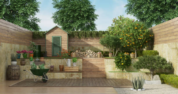 tuin op twee niveaus met houten schuur en fruitboom - old stone stair stockfoto's en -beelden