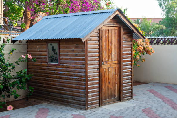 Garden shed Garden shed for the tools and gardening objects in South Africa commonly called Wendy House shed stock pictures, royalty-free photos & images