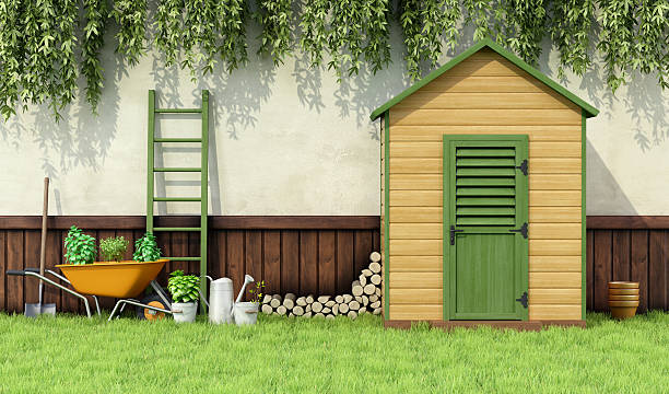 Garden shed Garden with gardening  tools and wooden shed with closed door - 3D Rendering shed stock pictures, royalty-free photos & images