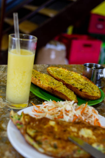 Garlic bread and omelet and salad breakfast. Vietnamese cuisine. stock photo