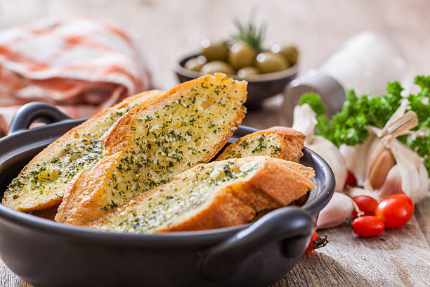 Garlic  bread Homemade garlic  bread and herb garlic bread stock pictures, royalty-free photos & images
