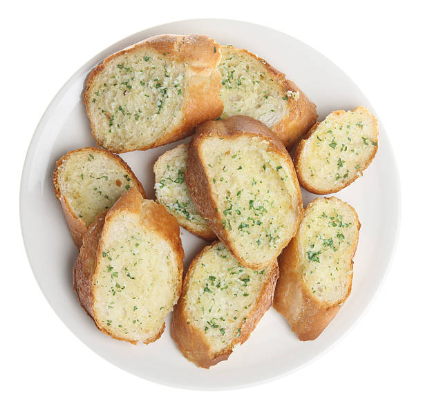 Garlic & Herb Bread Freshly-baked garlic & herb baguette garlic bread stock pictures, royalty-free photos & images