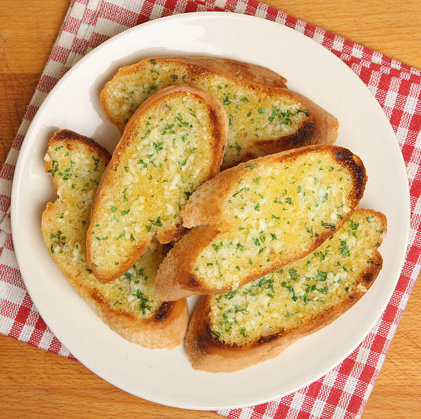 Garlic & Herb Bread Garlic and herb bread garlic bread stock pictures, royalty-free photos & images