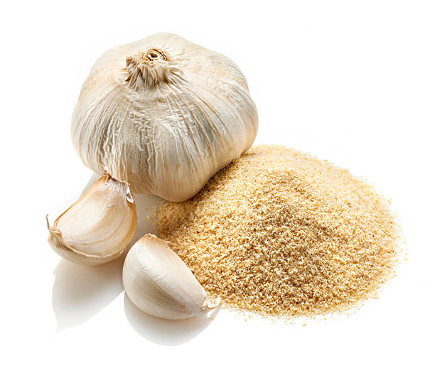 Garlic Whole, cloves and powder stock photo