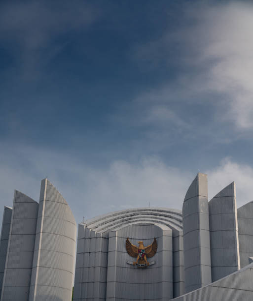 Garuda Pancasila Indonesian national symbols or emblems in Monument of Struggle Bandung. The emblem is showing Indonesia national motto Unity in Diversity , Bhineka Tunggal Ika stock photo