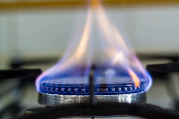 Gas burning from a kitchen gas stove stock photo