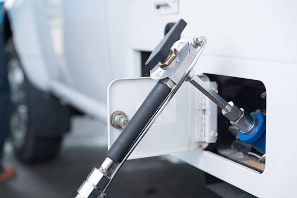 Gas dispenser for refuel Vehicle fueling facility. stock photo