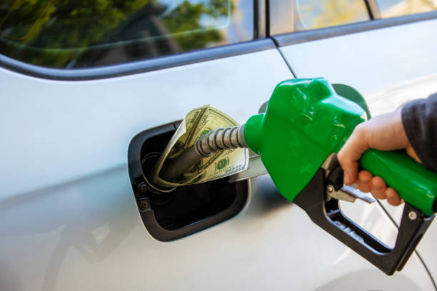 Gas Prices Increasing at the Pump Station stock photo