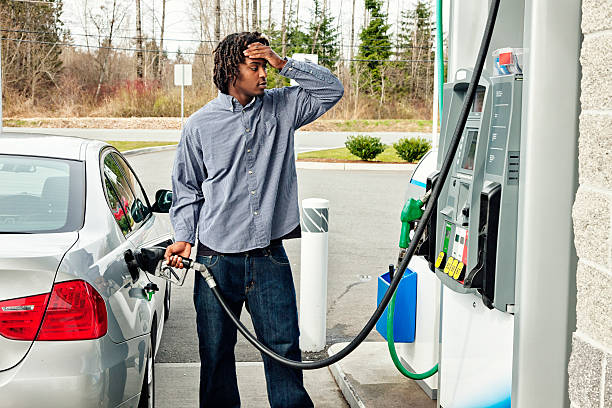 210 Teen Pumping Gas Stock Photos, Pictures &amp; Royalty-Free Images - iStock