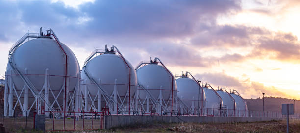 Gas storage tanks at sunset. Concepts series. gas stock pictures, royalty-free photos & images