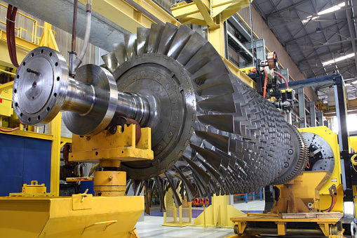 gas turbine rotor being serviced at workshop