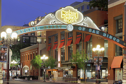 San Diego, USA - May 12, 2021: Night time view of the entryway arch to the Gaslamp Quarter (San Diego, California).