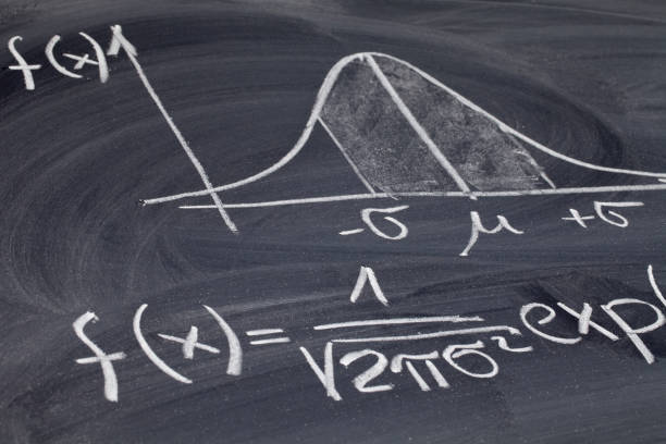 Gaussian or bell curve on a blackboard Gaussian, bell or normal distribution curve with equation sketched with white chalk on a blackboard, business, science and education concept bell curve stock pictures, royalty-free photos & images