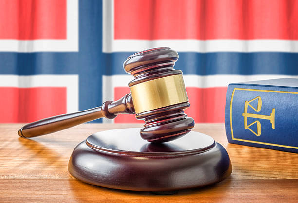 Gavel and a law book - Norway stock photo