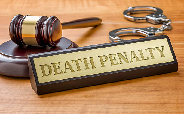 Gavel and a name plate with the engraving Death Penalty stock photo