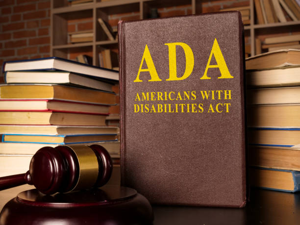 Gavel and Americans with Disabilities Act ADA book with documents. stock photo