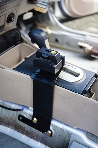 Close-up Gear shifter lock inside car