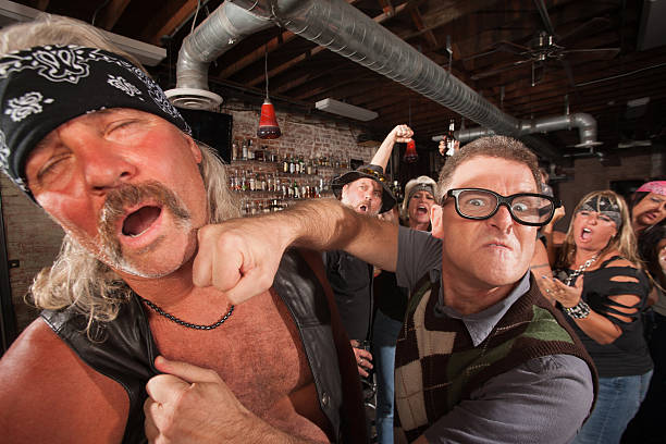 Geek Punches Man in Bar stock photo