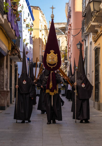 General shot of the Nazarenes during a Holy Week procession stock photo