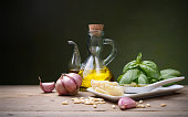 istock Genoese pesto sauce, the right ingredients in rustic setting, space for text. 1336737969