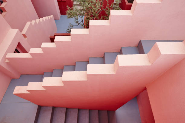 Geometric building stairs. The red wall, La manzanera. Calpe Geometric building stairs. The red wall, La manzanera. Calpe, Spain calpe stock pictures, royalty-free photos & images