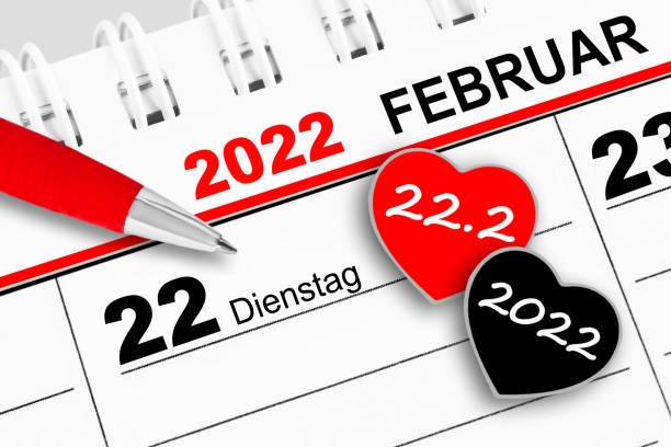 German calendar 2022 February 22  Tuesday and two hearts stock photo