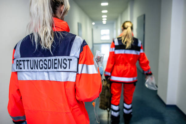 German paramedic runs in a floor to an accident stock photo