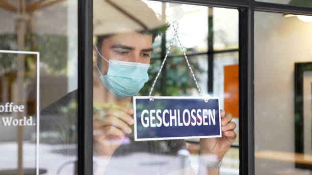 German small business closing during COVID-19 pandemic German small business closing during COVID-19 pandemic. german language stock pictures, royalty-free photos & images