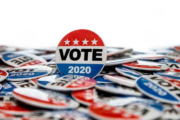 Get Out the Vote 2020 Presidential Voting Buttons High quality stock studio photography of Vote 2020 presidential election buttons democratic party usa stock pictures, royalty-free photos & images