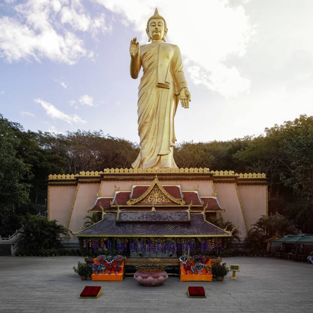 Giant Buddha in the Mengle Temple in Jinghong - Xishuangbanna capital in Yunnan stock photo