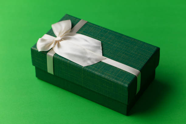 gift box. Christmas gift on plain background. Christmas concept. stock photo