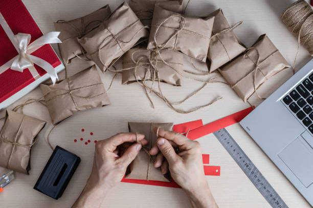 Gift wrapping and sending top view. Mail Logistics. Flat lay stock photo