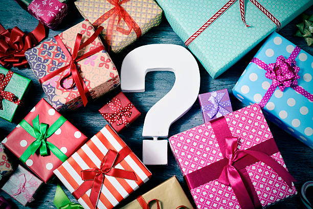 gifts and question mark stock photo
