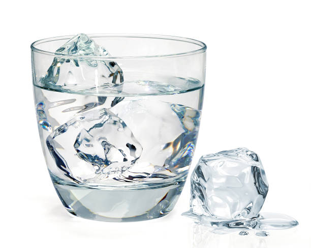 Gin, vodka or icy water Gin, vodka or icy water in rocks glass isolated on white background vodka stock pictures, royalty-free photos & images