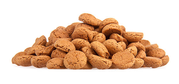 ginger nuts, dutch sweets for the celebration of sinterklaas at - pepernoten stockfoto's en -beelden