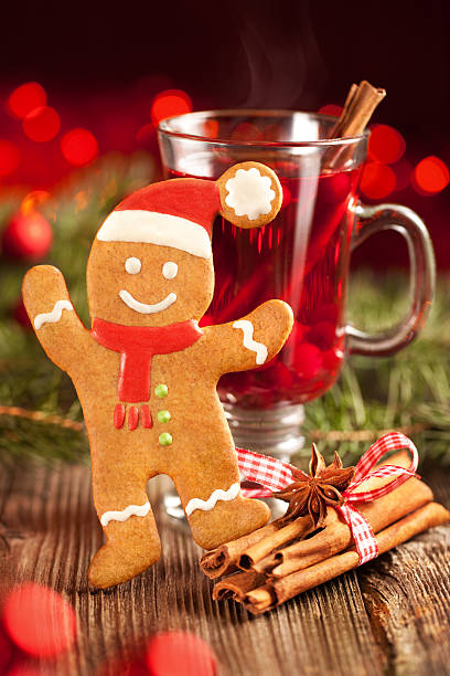 Gingerbread man and glass of mulled wine stock photo