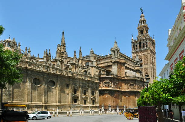 Giralda and Seville Cathedral, Spain Giralda and Seville Cathedral, Spain seville cathedral stock pictures, royalty-free photos & images