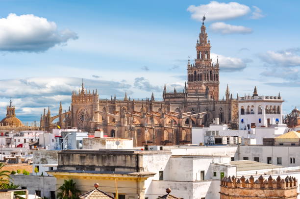 Giralda tower and Seville Cathedral, Spain Giralda tower and Seville Cathedral, Spain seville cathedral stock pictures, royalty-free photos & images