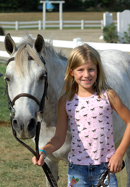 Girl and Pony stock photo