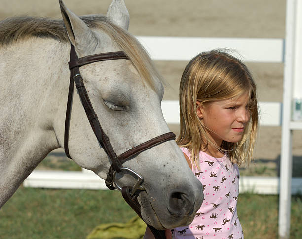 Girl and Pony stock photo