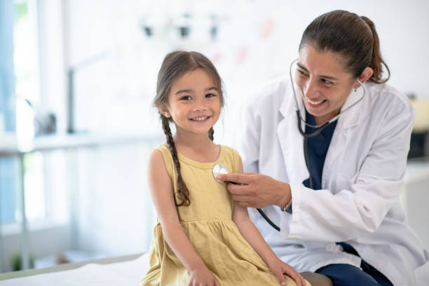 Girl goes for medical check up stock photo