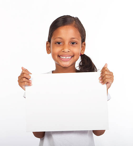 girl holding white board stock photo