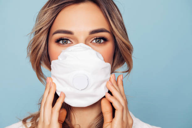 Girl in respiratory mask Girl in respiratory mask nurse face stock pictures, royalty-free photos & images