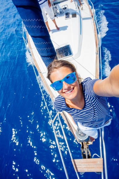 Girl relaxing On Yacht in Greece stock photo