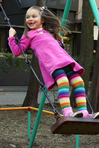 Girl On Swing Stock Photo - Download Image Now - iStock