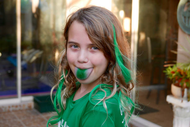 Girl wearing green for St. Patrick's Day stock photo