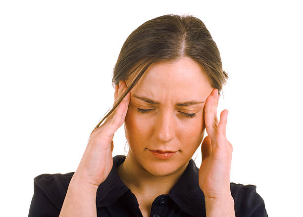 Girl with a headache stock photo