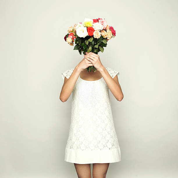 Girl with a head-roses stock photo