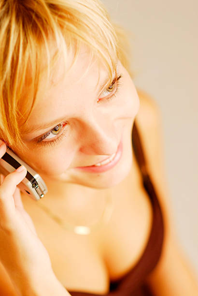 Girl with cellphone stock photo