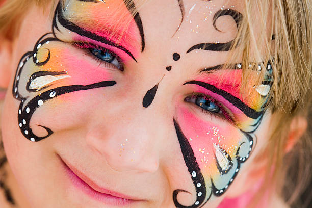 Girl with face painted stock photo
